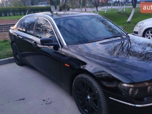 Чорний БМВ 7 Серія, об'ємом двигуна 4.4 л та пробігом 430 тис. км за 6099 $, фото 1 на Automoto.ua