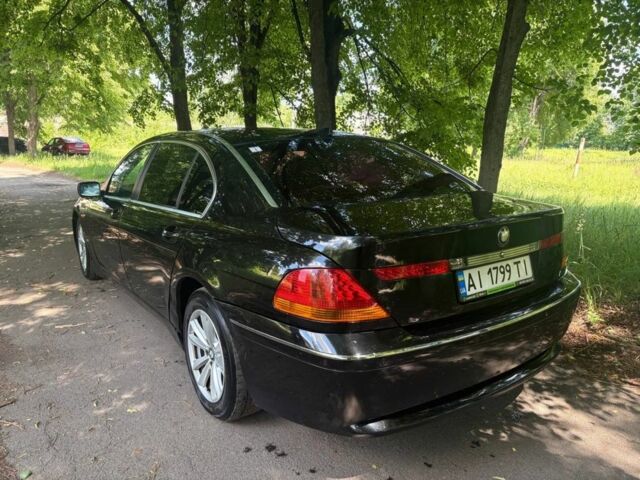 Черный БМВ 7 Серия, объемом двигателя 3.6 л и пробегом 420 тыс. км за 4500 $, фото 1 на Automoto.ua