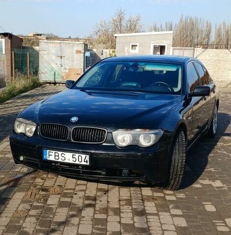 Чорний БМВ 7 Серія, об'ємом двигуна 3 л та пробігом 300 тис. км за 3200 $, фото 1 на Automoto.ua