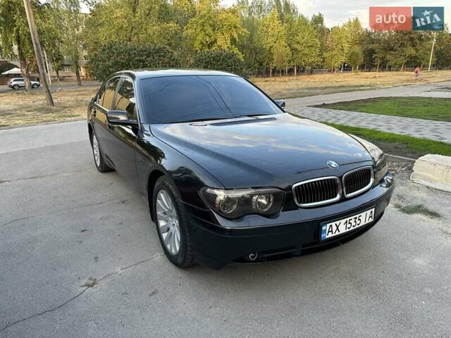 Черный БМВ 7 Серия, объемом двигателя 3.6 л и пробегом 356 тыс. км за 7750 $, фото 1 на Automoto.ua