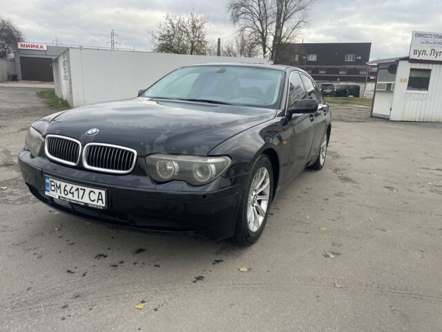 Черный БМВ 7 Серия, объемом двигателя 4.4 л и пробегом 320 тыс. км за 4000 $, фото 1 на Automoto.ua