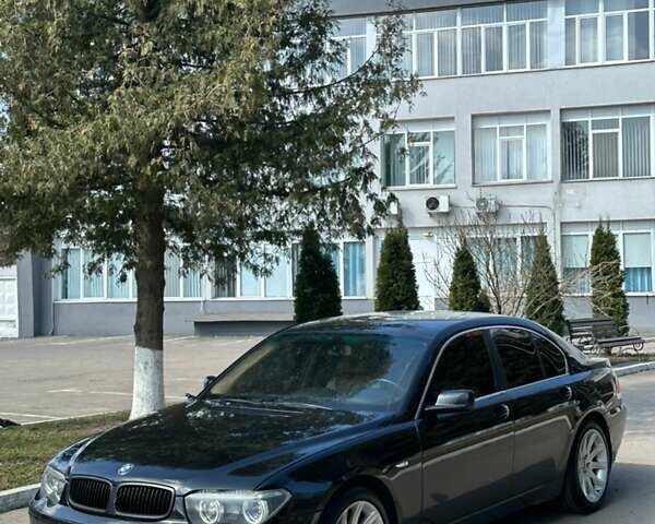 Чорний БМВ 7 Серія, об'ємом двигуна 3.6 л та пробігом 310 тис. км за 4950 $, фото 1 на Automoto.ua