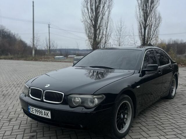 Черный БМВ 7 Серия, объемом двигателя 4.4 л и пробегом 360 тыс. км за 4300 $, фото 1 на Automoto.ua