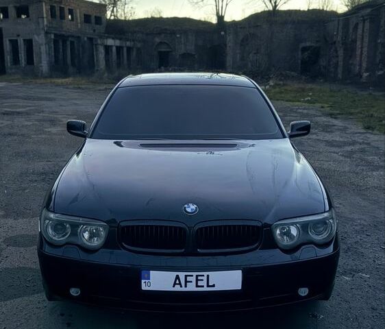 Черный БМВ 7 Серия, объемом двигателя 4.4 л и пробегом 411 тыс. км за 4600 $, фото 1 на Automoto.ua