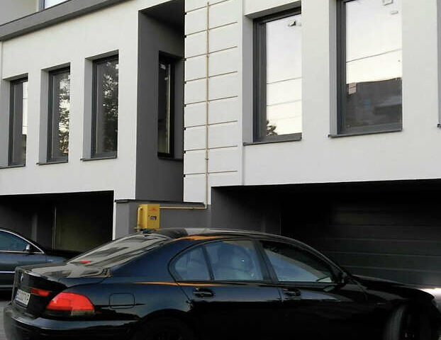 Чорний БМВ 7 Серія, об'ємом двигуна 4.4 л та пробігом 297 тис. км за 7700 $, фото 1 на Automoto.ua