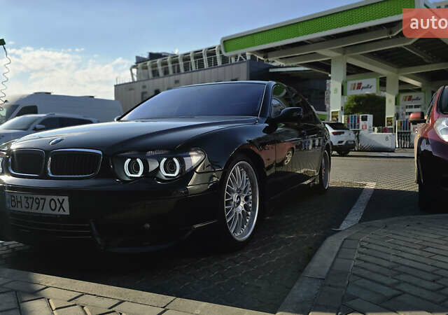 Черный БМВ 7 Серия, объемом двигателя 4.4 л и пробегом 210 тыс. км за 8500 $, фото 1 на Automoto.ua