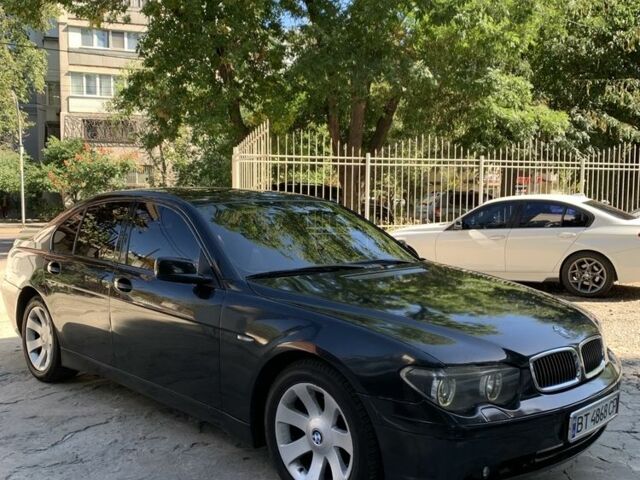 Чорний БМВ 7 Серія, об'ємом двигуна 3 л та пробігом 300 тис. км за 6900 $, фото 1 на Automoto.ua