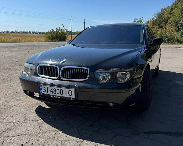 Чорний БМВ 7 Серія, об'ємом двигуна 4.4 л та пробігом 462 тис. км за 5100 $, фото 1 на Automoto.ua
