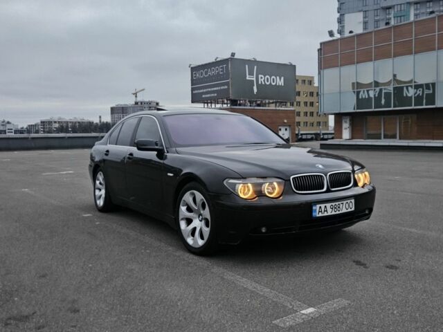 Черный БМВ 7 Серия, объемом двигателя 3 л и пробегом 465 тыс. км за 9104 $, фото 1 на Automoto.ua