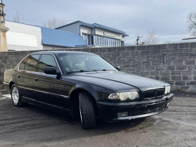 Чорний БМВ 7 Серія, об'ємом двигуна 3 л та пробігом 300 тис. км за 2999 $, фото 1 на Automoto.ua