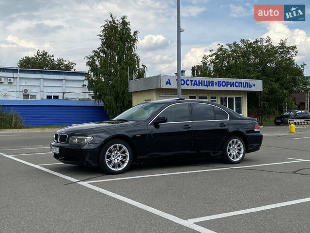 Черный БМВ 7 Серия, объемом двигателя 4.4 л и пробегом 285 тыс. км за 3800 $, фото 1 на Automoto.ua