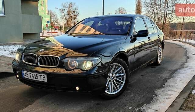 Черный БМВ 7 Серия, объемом двигателя 4.4 л и пробегом 167 тыс. км за 8699 $, фото 1 на Automoto.ua