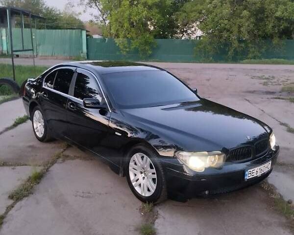 Черный БМВ 7 Серия, объемом двигателя 3.6 л и пробегом 450 тыс. км за 6950 $, фото 1 на Automoto.ua