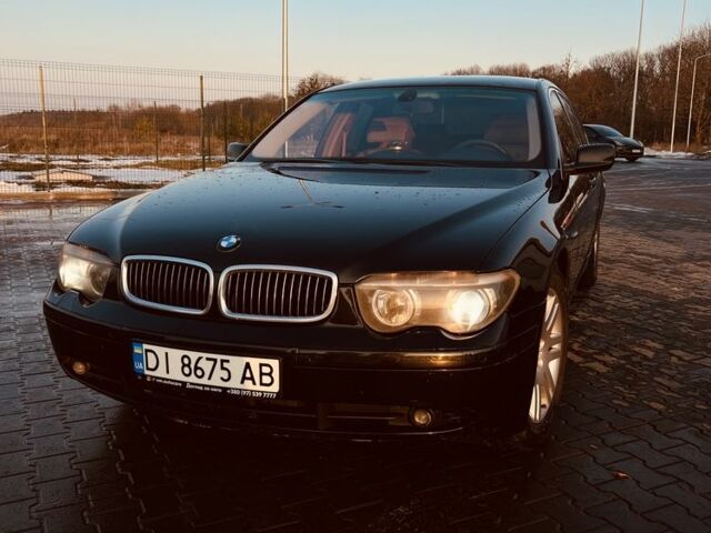 Черный БМВ 7 Серия, объемом двигателя 3.6 л и пробегом 380 тыс. км за 6500 $, фото 1 на Automoto.ua