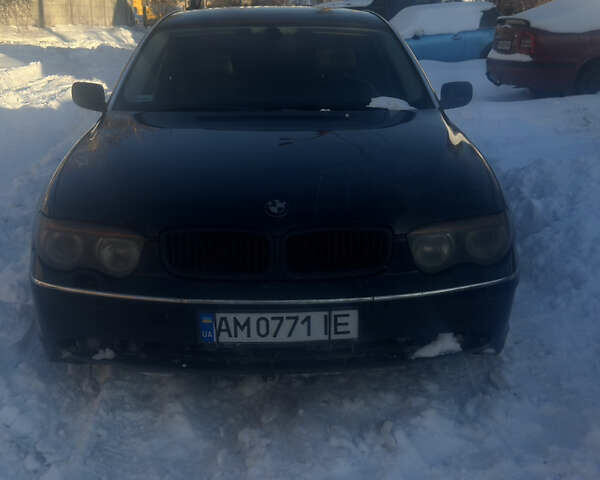 Черный БМВ 7 Серия, объемом двигателя 3.6 л и пробегом 421 тыс. км за 5200 $, фото 1 на Automoto.ua
