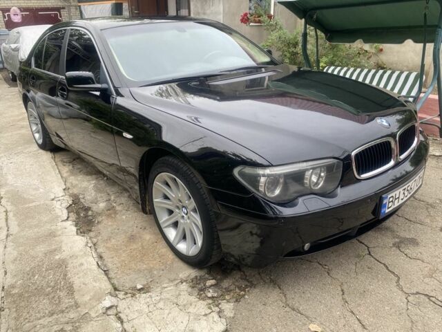 Черный БМВ 7 Серия, объемом двигателя 3.6 л и пробегом 270 тыс. км за 6900 $, фото 1 на Automoto.ua