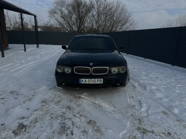 Чорний БМВ 7 Серія, об'ємом двигуна 4.4 л та пробігом 200 тис. км за 5300 $, фото 1 на Automoto.ua