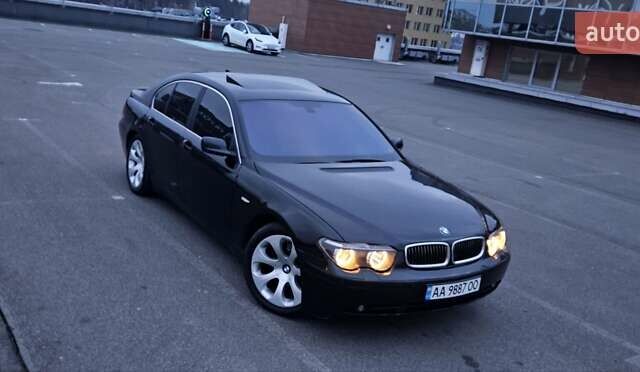 Черный БМВ 7 Серия, объемом двигателя 2.99 л и пробегом 465 тыс. км за 9300 $, фото 1 на Automoto.ua