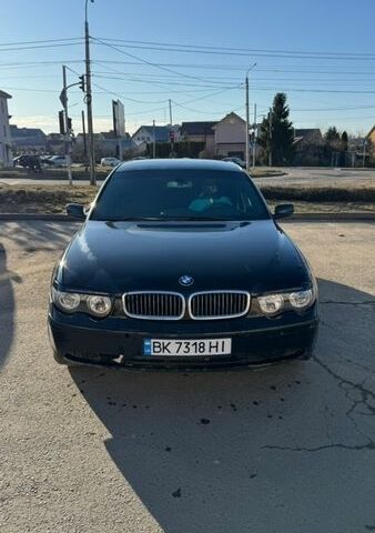 Черный БМВ 7 Серия, объемом двигателя 3 л и пробегом 267 тыс. км за 5000 $, фото 1 на Automoto.ua
