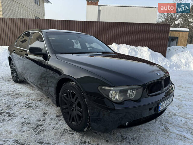 Черный БМВ 7 Серия, объемом двигателя 3 л и пробегом 444 тыс. км за 6299 $, фото 1 на Automoto.ua