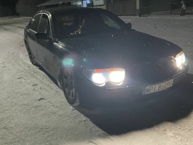 Черный БМВ 7 Серия, объемом двигателя 4 л и пробегом 389 тыс. км за 1800 $, фото 1 на Automoto.ua