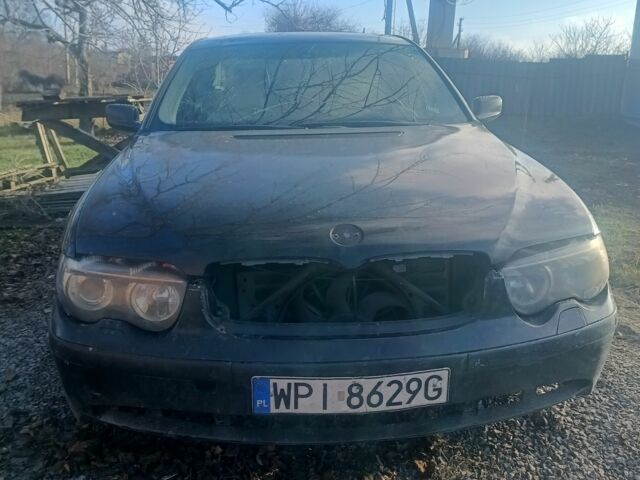 Чорний БМВ 7 Серія, об'ємом двигуна 4 л та пробігом 388 тис. км за 2000 $, фото 1 на Automoto.ua