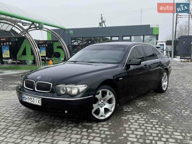 Черный БМВ 7 Серия, объемом двигателя 4.4 л и пробегом 234 тыс. км за 7300 $, фото 1 на Automoto.ua
