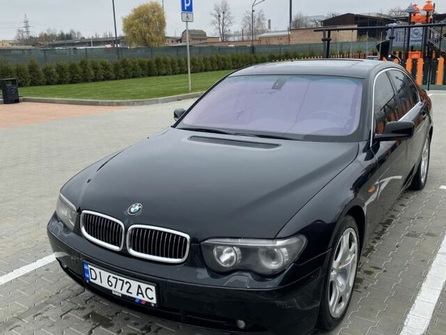 Черный БМВ 7 Серия, объемом двигателя 4.8 л и пробегом 310 тыс. км за 5500 $, фото 1 на Automoto.ua