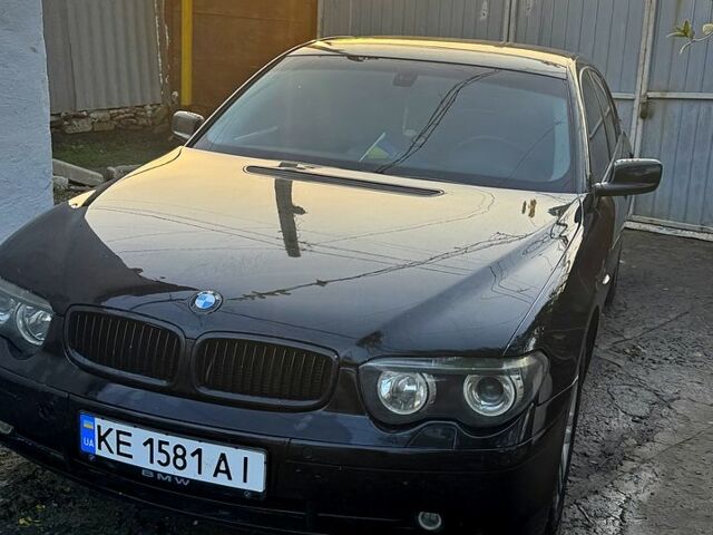 Черный БМВ 7 Серия, объемом двигателя 3.6 л и пробегом 445 тыс. км за 7750 $, фото 1 на Automoto.ua