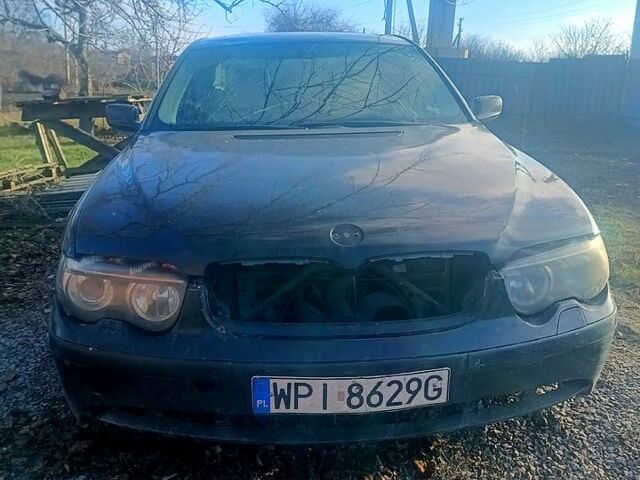 Чорний БМВ 7 Серія, об'ємом двигуна 4 л та пробігом 388 тис. км за 2000 $, фото 1 на Automoto.ua