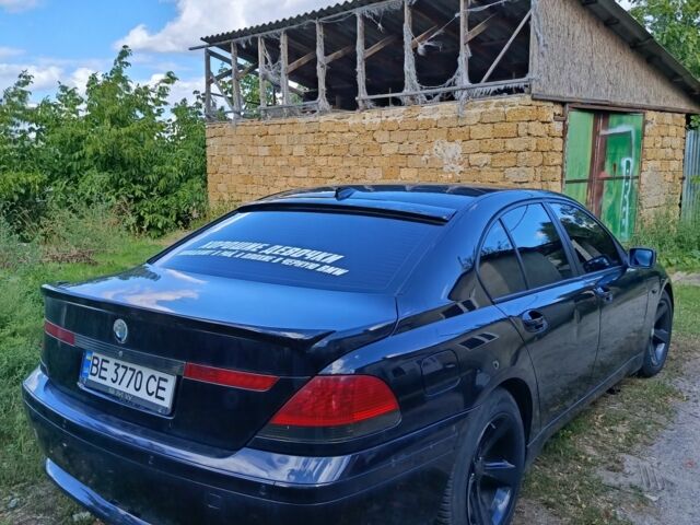 Черный БМВ 7 Серия, объемом двигателя 4 л и пробегом 222 тыс. км за 3999 $, фото 1 на Automoto.ua