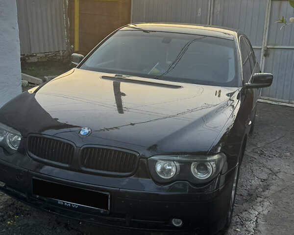 Чорний БМВ 7 Серія, об'ємом двигуна 3.6 л та пробігом 450 тис. км за 8975 $, фото 1 на Automoto.ua