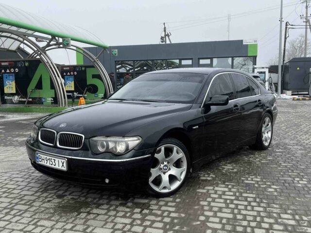 Черный БМВ 7 Серия, объемом двигателя 4.4 л и пробегом 234 тыс. км за 7300 $, фото 1 на Automoto.ua