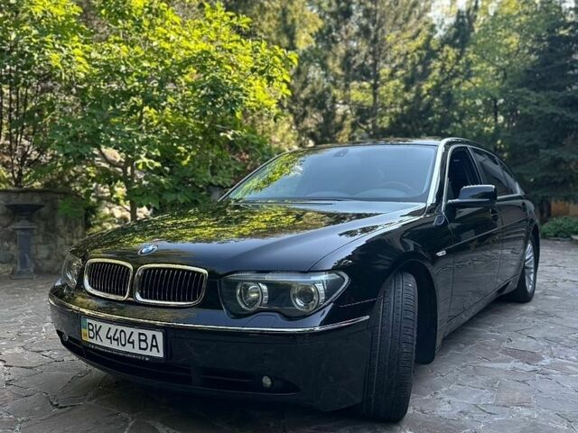 Черный БМВ 7 Серия, объемом двигателя 4.4 л и пробегом 37 тыс. км за 20000 $, фото 1 на Automoto.ua