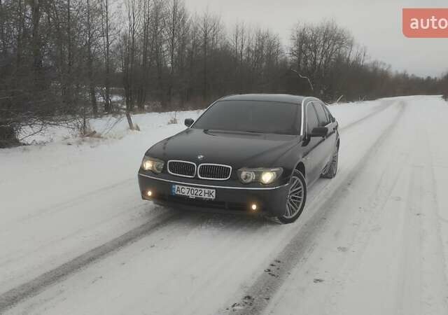 Чорний БМВ 7 Серія, об'ємом двигуна 2.98 л та пробігом 326 тис. км за 6500 $, фото 1 на Automoto.ua