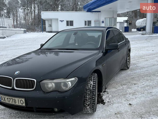 Чорний БМВ 7 Серія, об'ємом двигуна 3 л та пробігом 400 тис. км за 6500 $, фото 1 на Automoto.ua