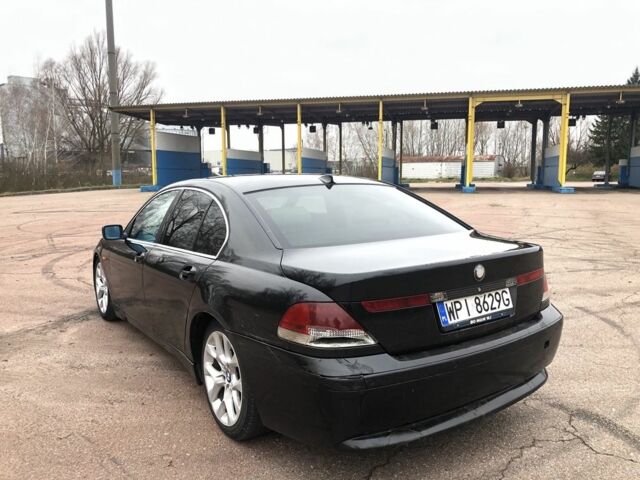 Чорний БМВ 7 Серія, об'ємом двигуна 4 л та пробігом 350 тис. км за 2900 $, фото 1 на Automoto.ua