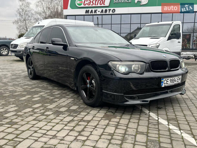 Черный БМВ 7 Серия, объемом двигателя 4.4 л и пробегом 400 тыс. км за 6500 $, фото 1 на Automoto.ua