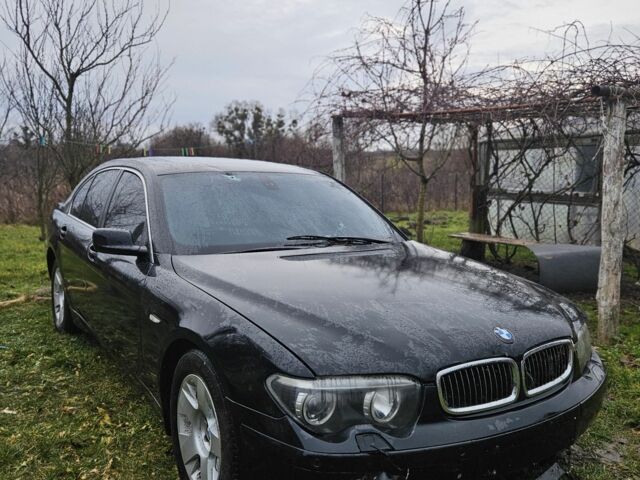 Черный БМВ 7 Серия, объемом двигателя 3 л и пробегом 300 тыс. км за 2700 $, фото 1 на Automoto.ua
