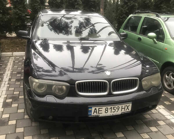 Черный БМВ 7 Серия, объемом двигателя 4.4 л и пробегом 350 тыс. км за 6400 $, фото 1 на Automoto.ua
