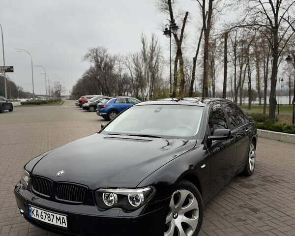Черный БМВ 7 Серия, объемом двигателя 3 л и пробегом 305 тыс. км за 6650 $, фото 1 на Automoto.ua
