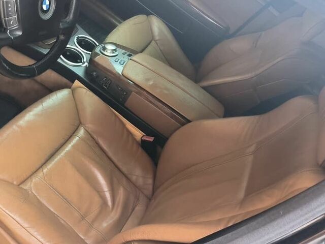 Черный БМВ 7 Серия, объемом двигателя 2.99 л и пробегом 495 тыс. км за 5900 $, фото 1 на Automoto.ua