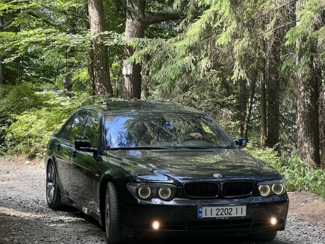 Черный БМВ 7 Серия, объемом двигателя 3 л и пробегом 30 тыс. км за 7000 $, фото 1 на Automoto.ua