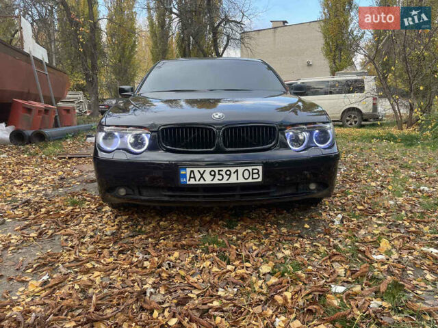 Черный БМВ 7 Серия, объемом двигателя 3 л и пробегом 550 тыс. км за 7000 $, фото 1 на Automoto.ua