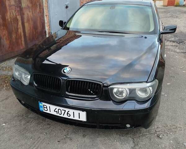 Черный БМВ 7 Серия, объемом двигателя 4.4 л и пробегом 407 тыс. км за 5600 $, фото 1 на Automoto.ua
