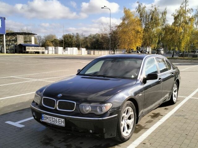 Черный БМВ 7 Серия, объемом двигателя 4.4 л и пробегом 240 тыс. км за 7000 $, фото 1 на Automoto.ua