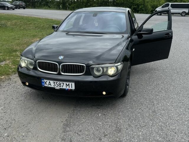 Чорний БМВ 7 Серія, об'ємом двигуна 4.4 л та пробігом 312 тис. км за 6400 $, фото 1 на Automoto.ua