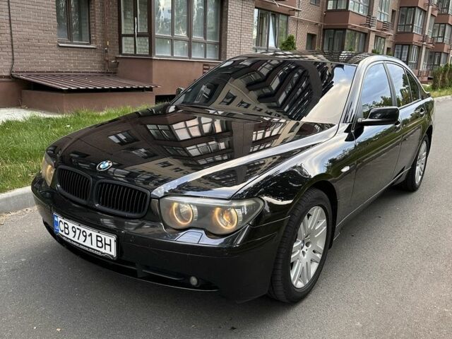 Черный БМВ 7 Серия, объемом двигателя 3 л и пробегом 303 тыс. км за 5799 $, фото 1 на Automoto.ua