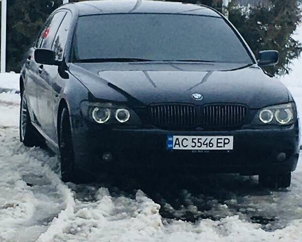 Черный БМВ 7 Серия, объемом двигателя 3 л и пробегом 259 тыс. км за 8200 $, фото 1 на Automoto.ua