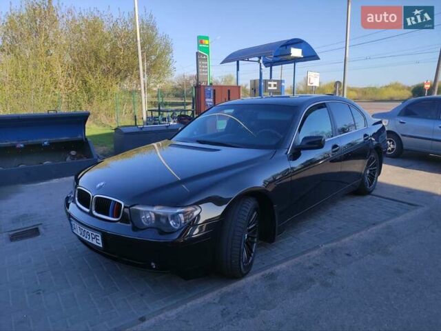 Чорний БМВ 7 Серія, об'ємом двигуна 3 л та пробігом 430 тис. км за 7300 $, фото 1 на Automoto.ua